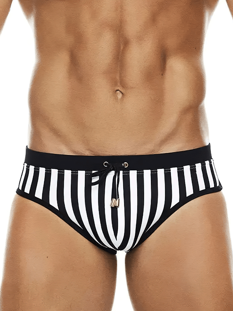 Men's zebra print quick dry swim briefs, black and white stripes, stylish and bold for beach or pool.